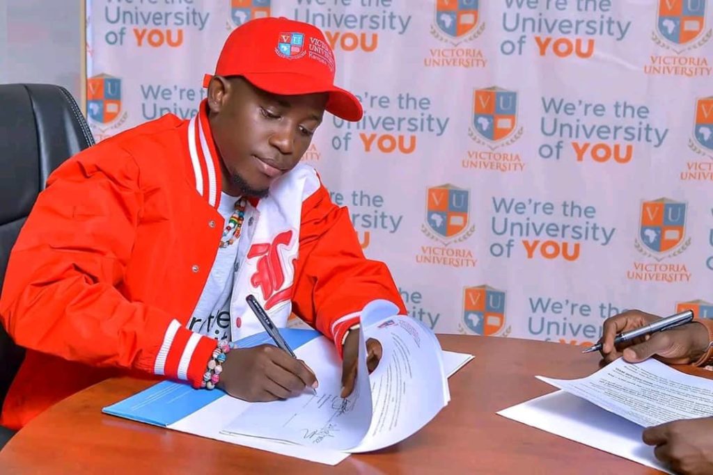Victor Ruz enrols at Victoria University Kampala.