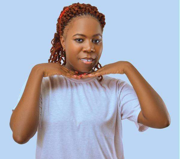 Natasha poses while supporting her chin