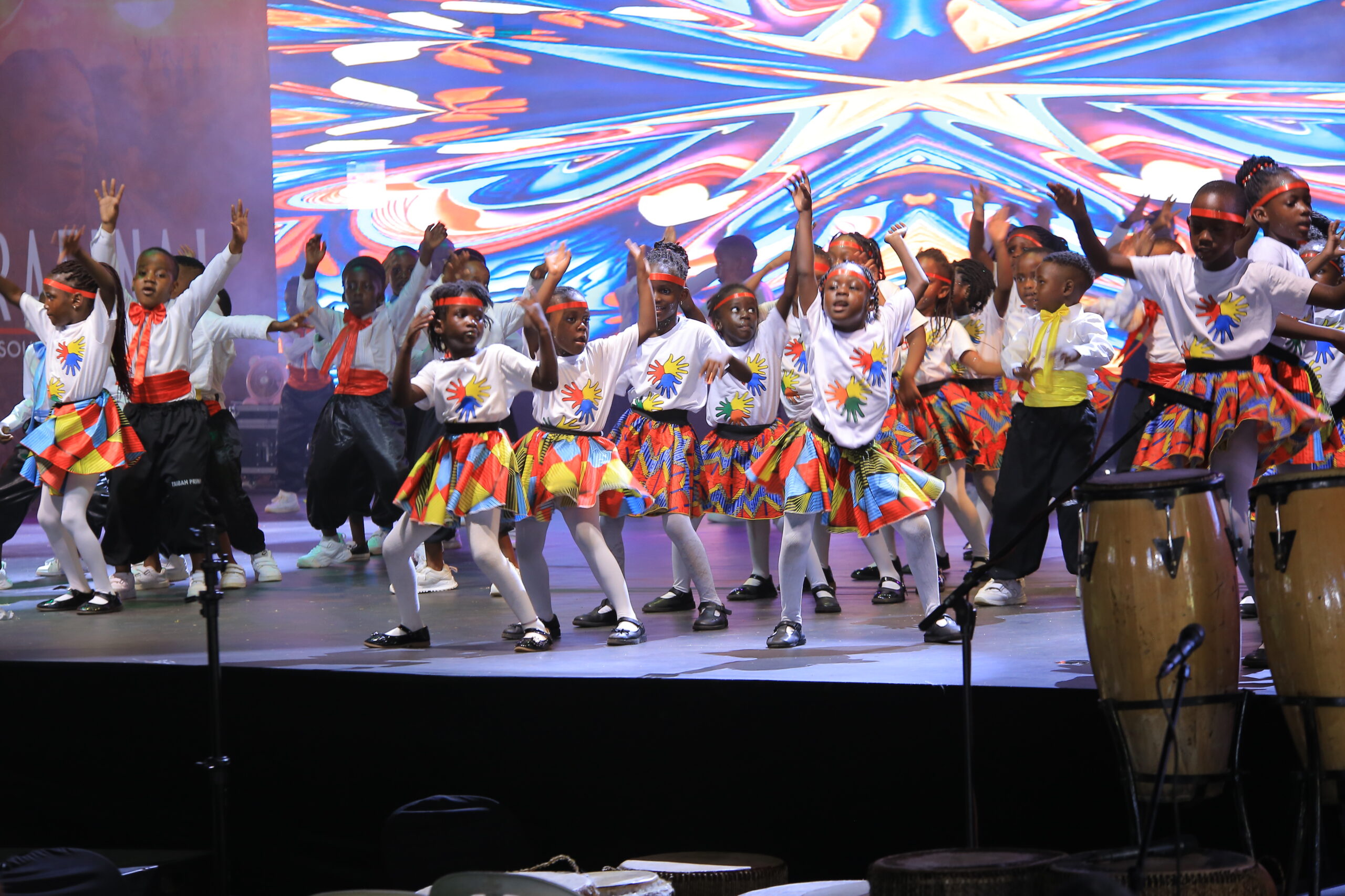 Little girls dancing for their parents from taibah international school for the Sarafina play