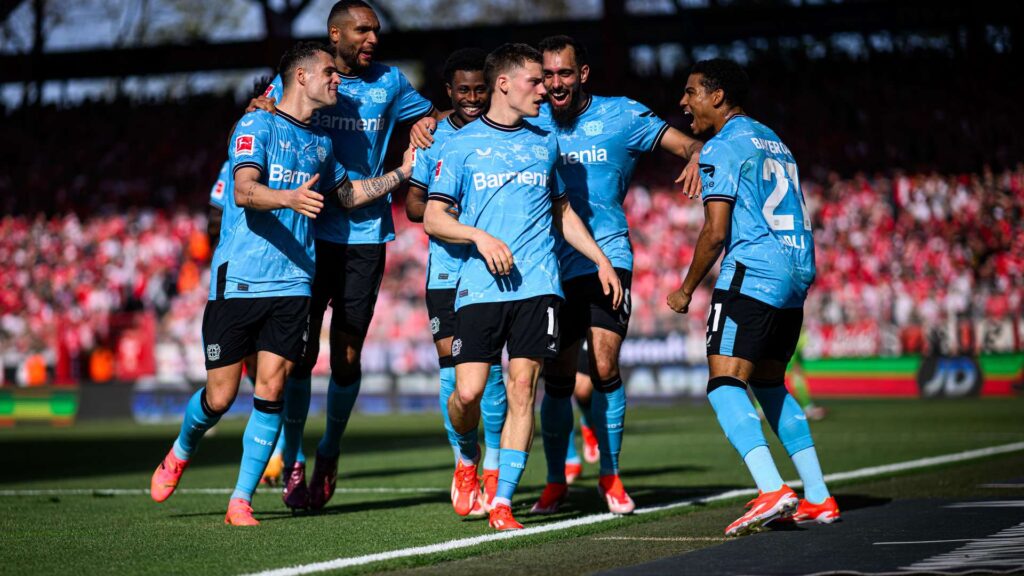 Bayer Leverkusen players celebrating.
