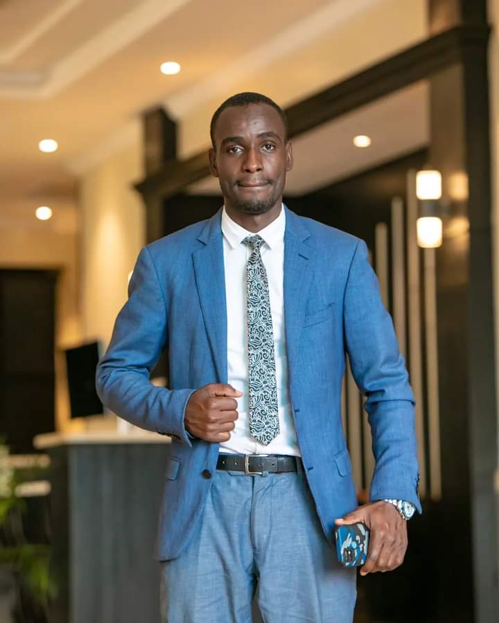 Joshua Kagoro In a suit