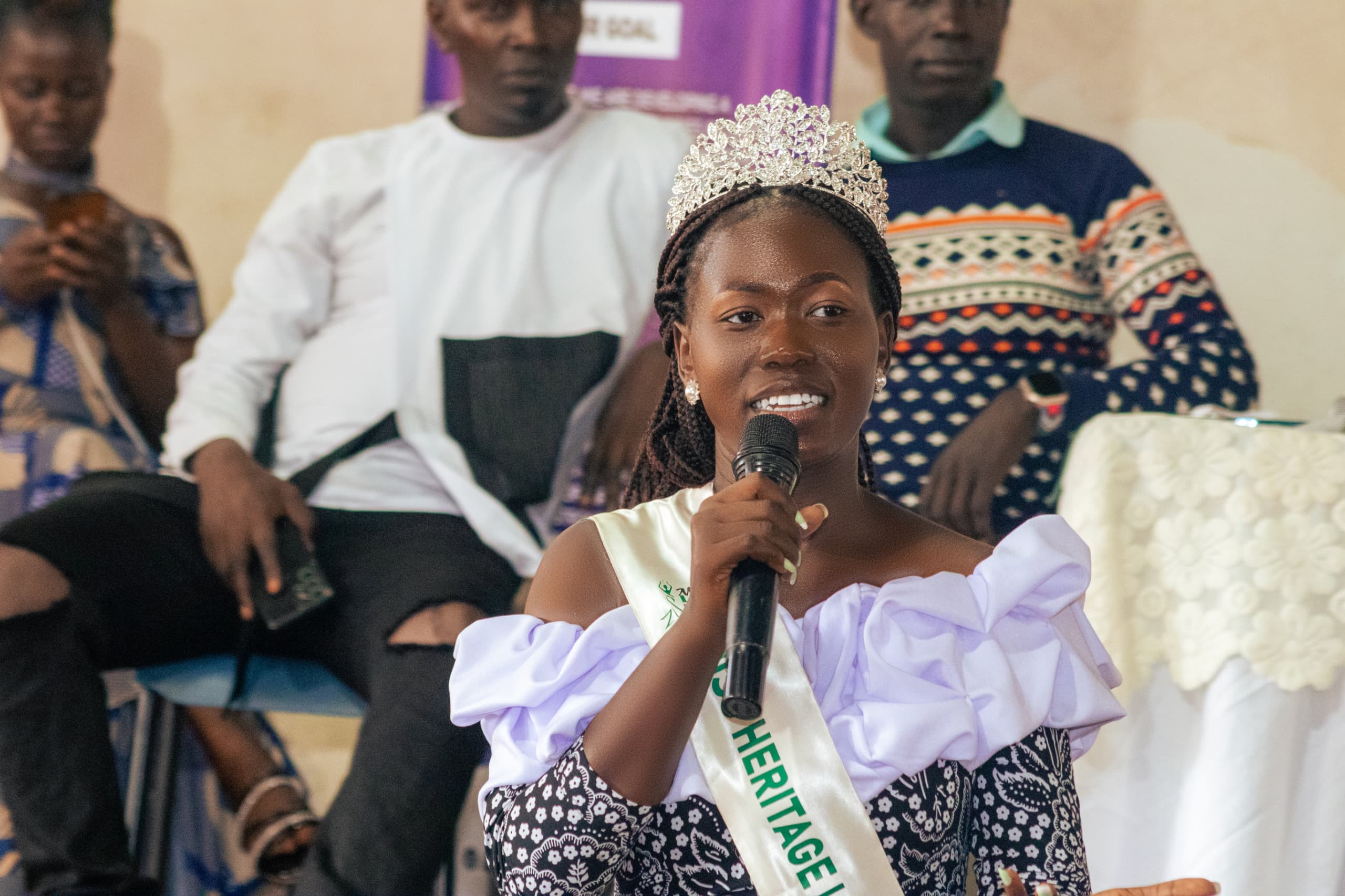 Rita Alobo Miss Heritage speaking at The Miss Lango Mentorship Program 2024