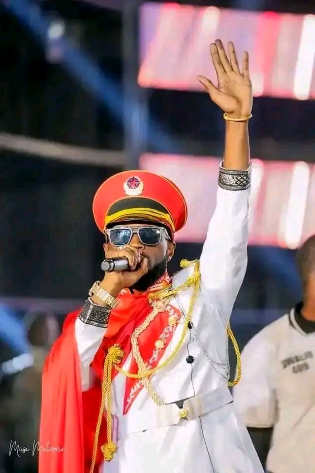 Mikie Wine on stage at Tusaabale Concert